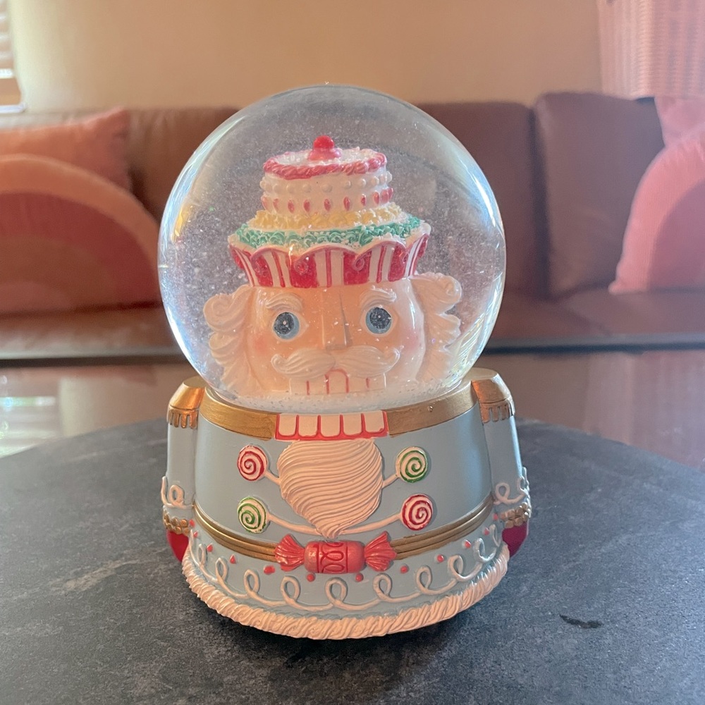 Pastel nutcracker snowglobe with music